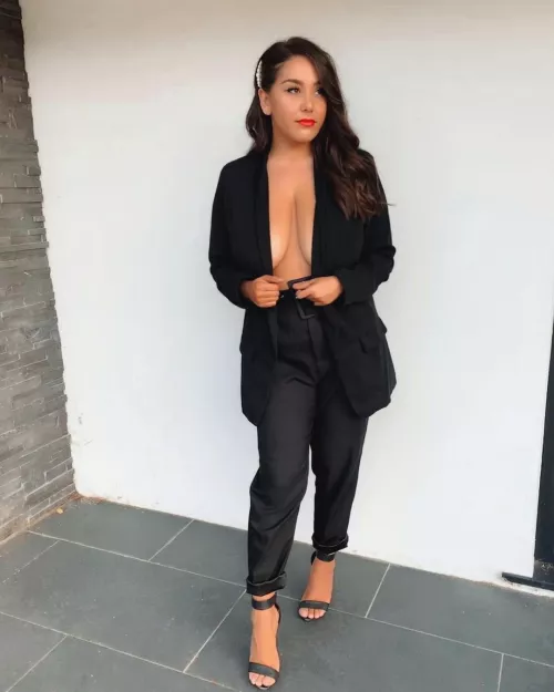 Busty beauty in black