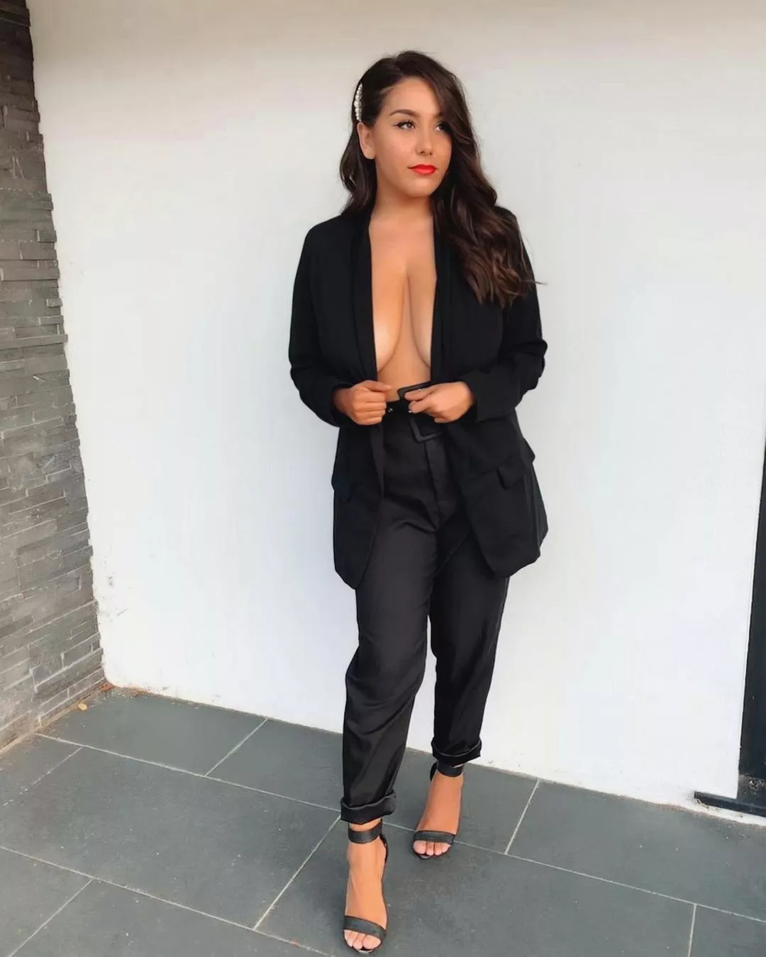 Busty beauty in black