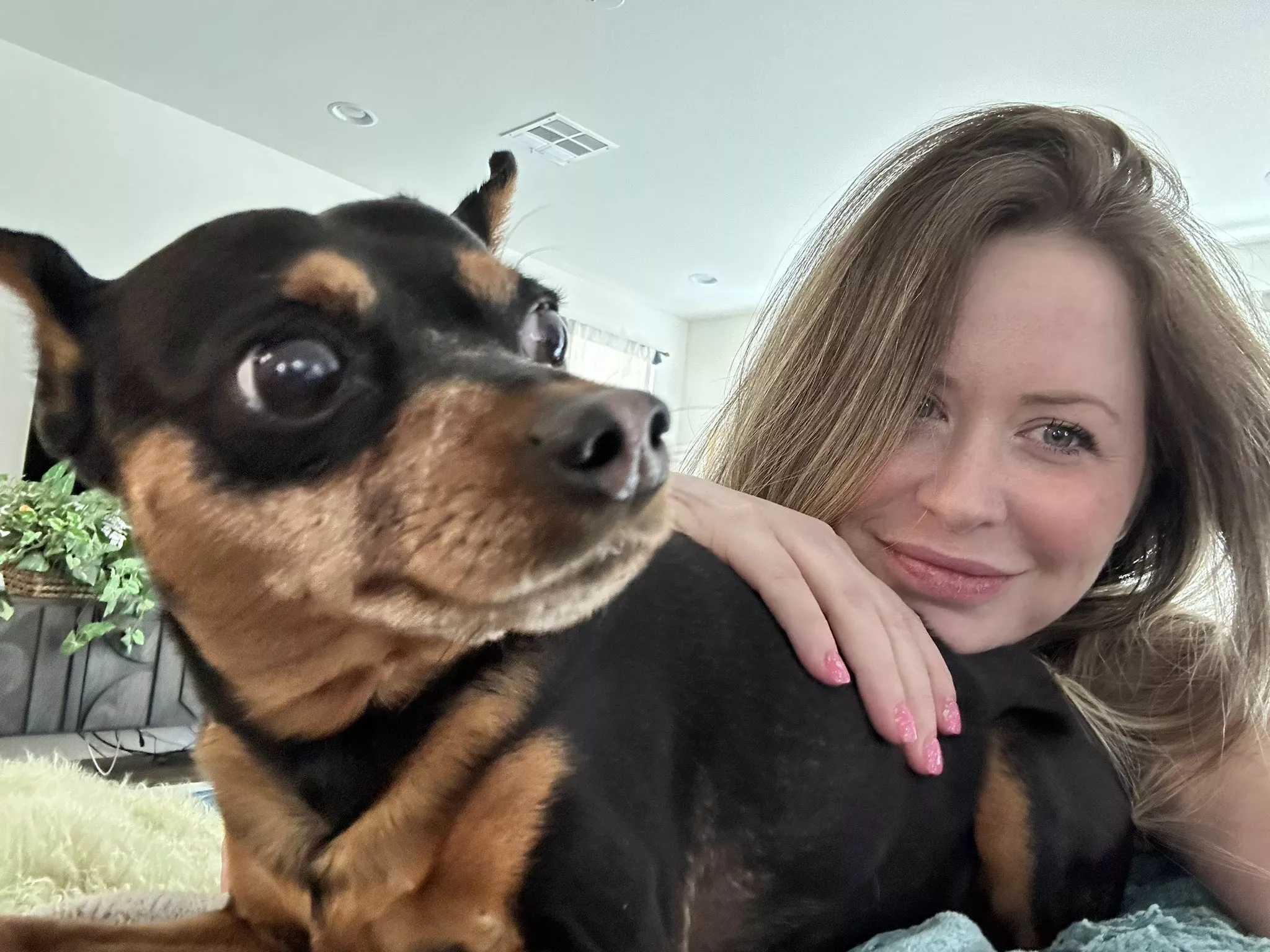 Loves her dog. Twitter 03-04-2023