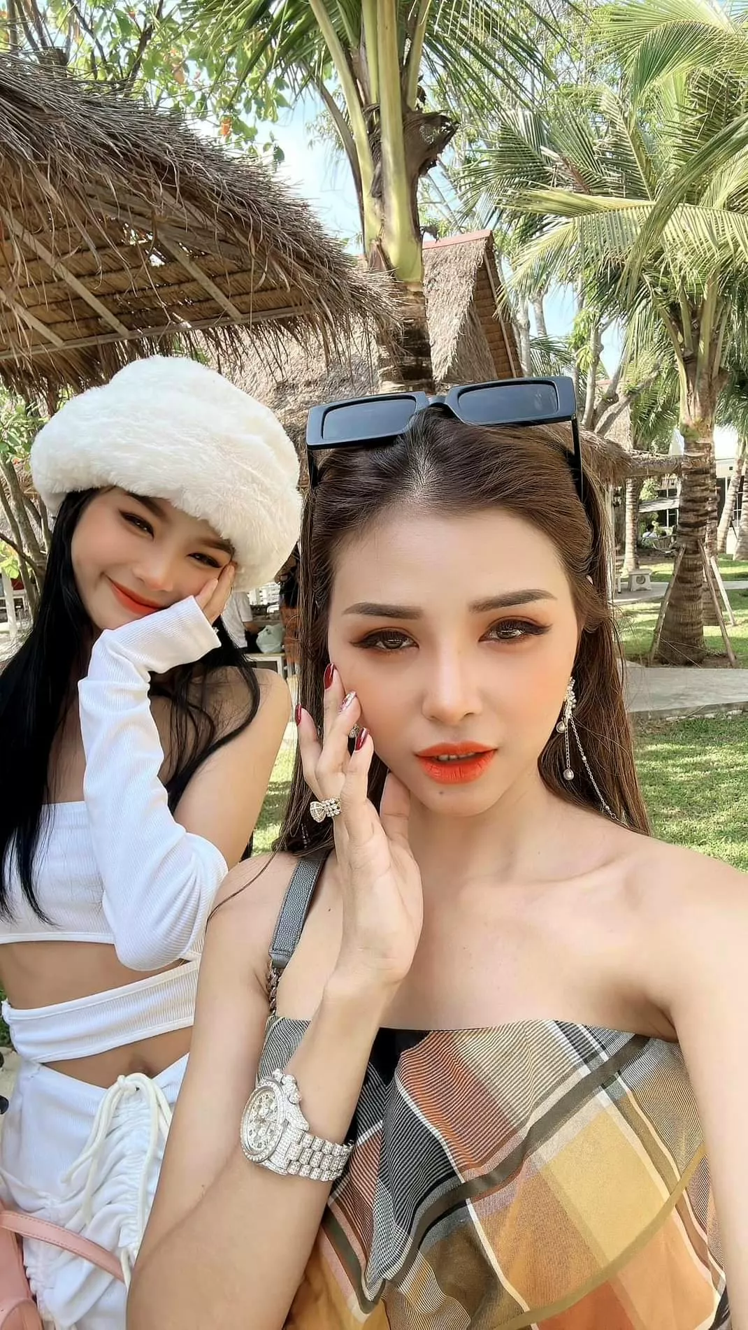 Me (glasses) and my little sister (hat)