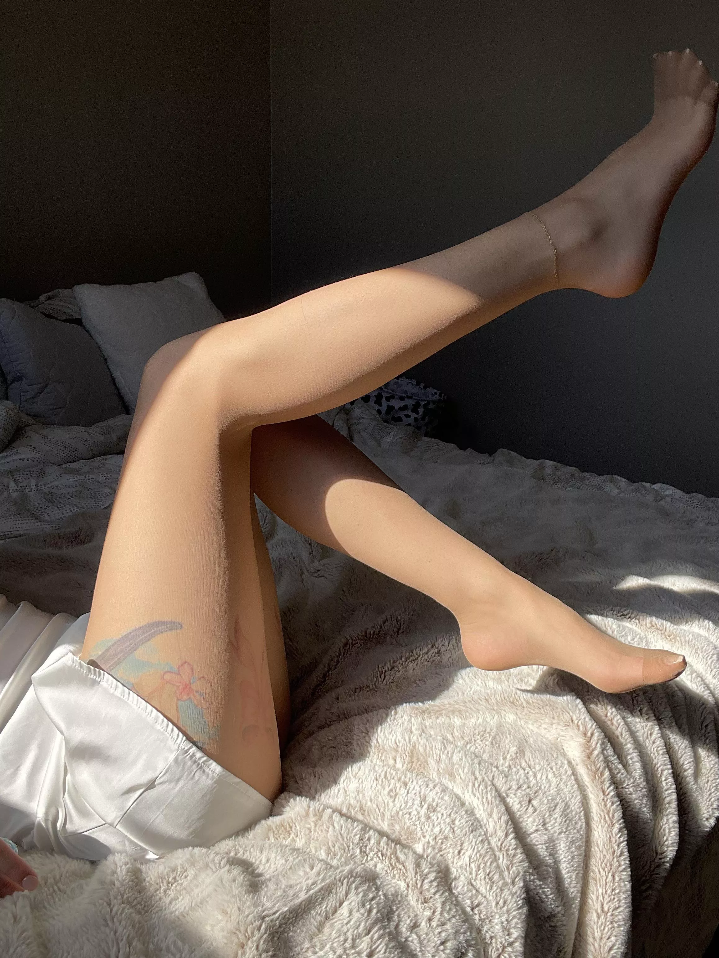 Soft nude nylons and long legs 🤭