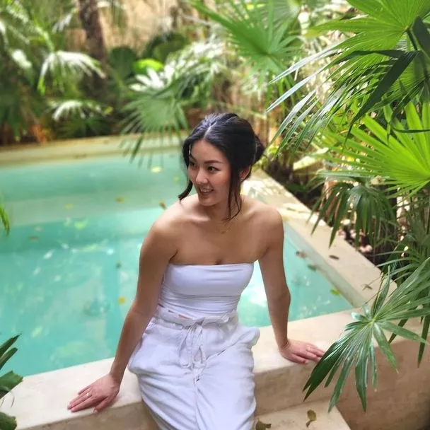 Pretty Japanese Lady by a Pool