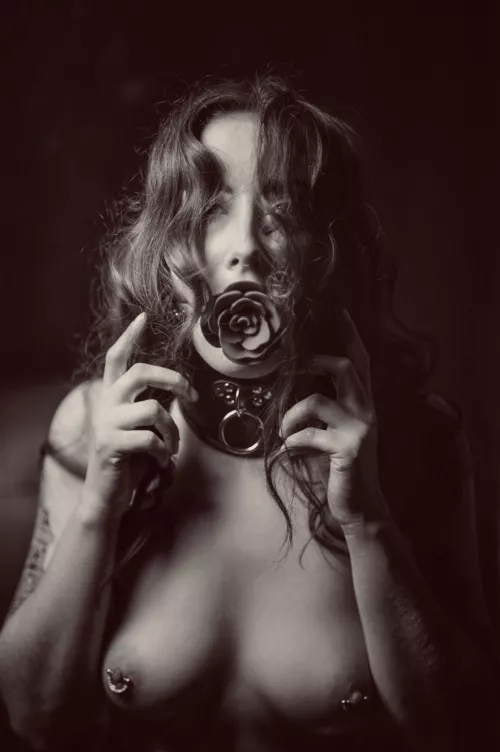 Collared and gagged.