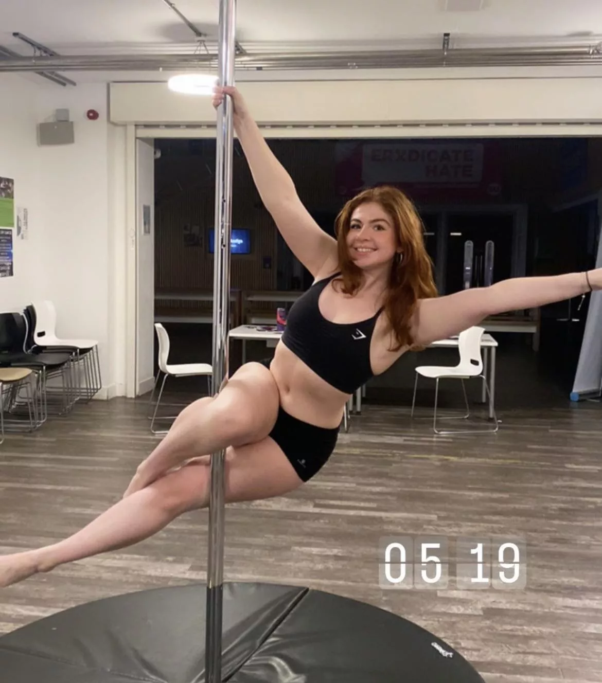 Ginger learning to become a pole dancer