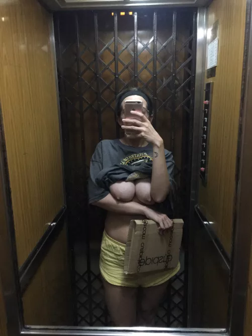 I went to pick up a package and got horny in the elevator.