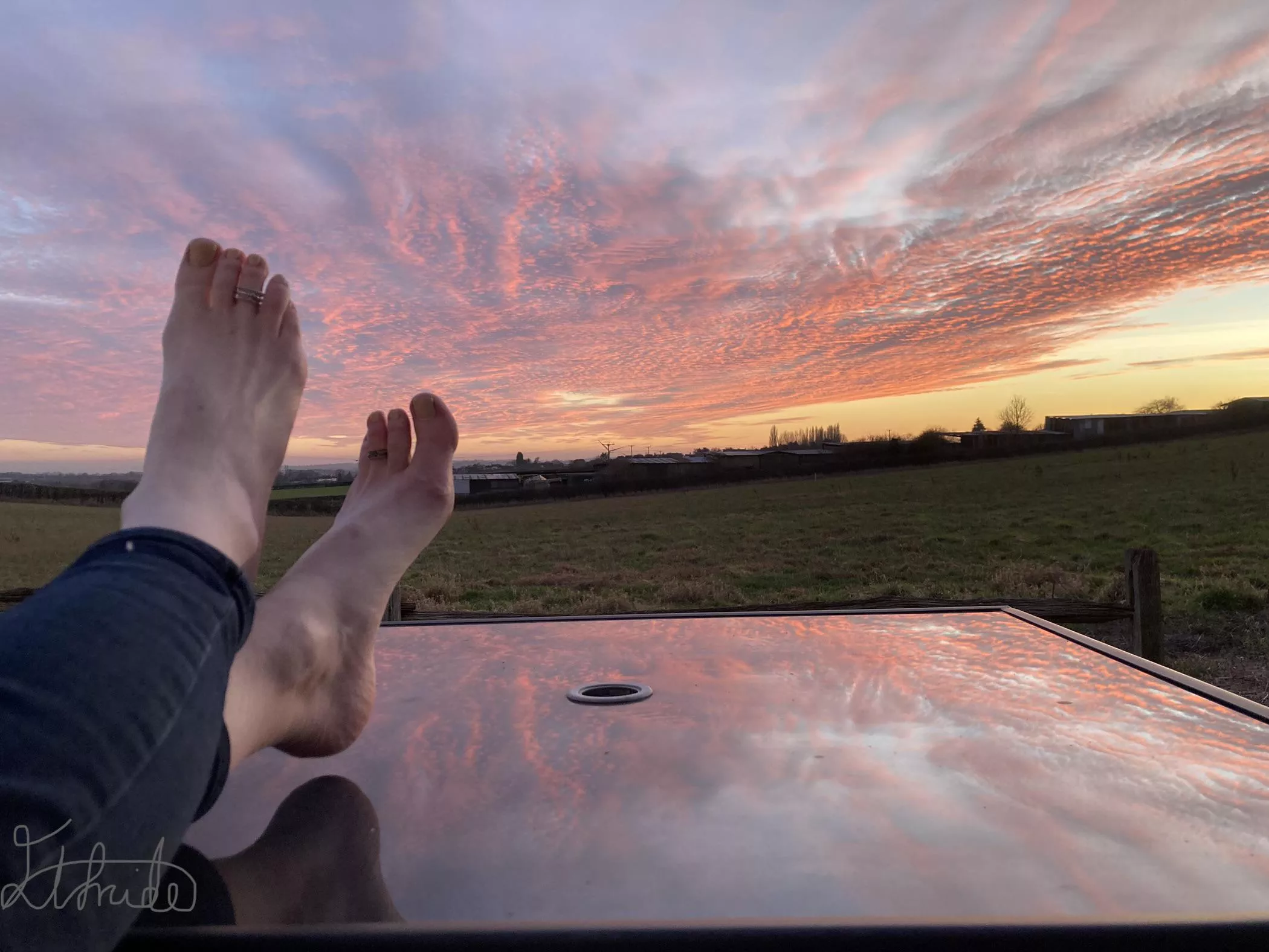 Enjoying the sunset with my feet up, would you look?
