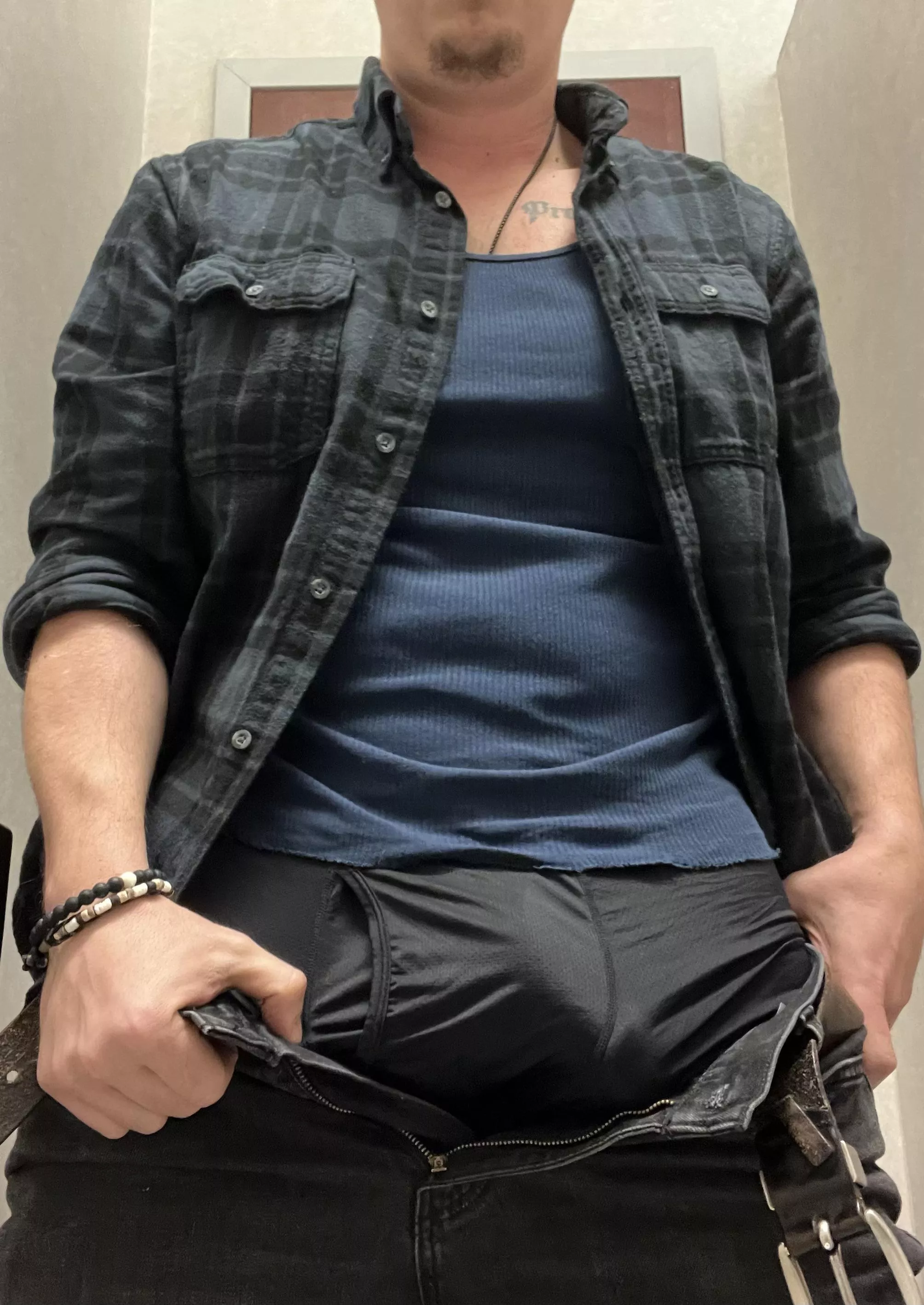 Unbuttoned enough to spark your interest but covered up enough to have you wanting more