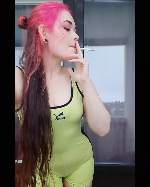 Smoking redhead in a sporty outfit🥰