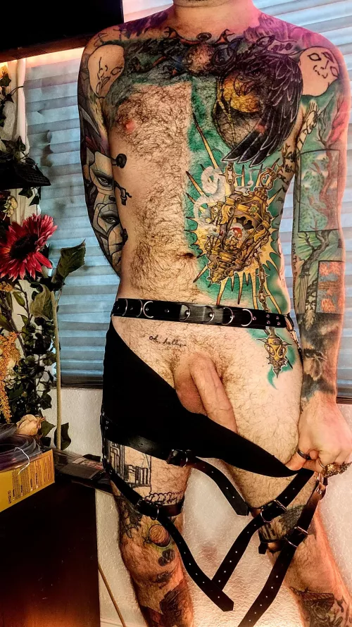 The black leather against my colorful skin is the aesthetic that gets my blood moving