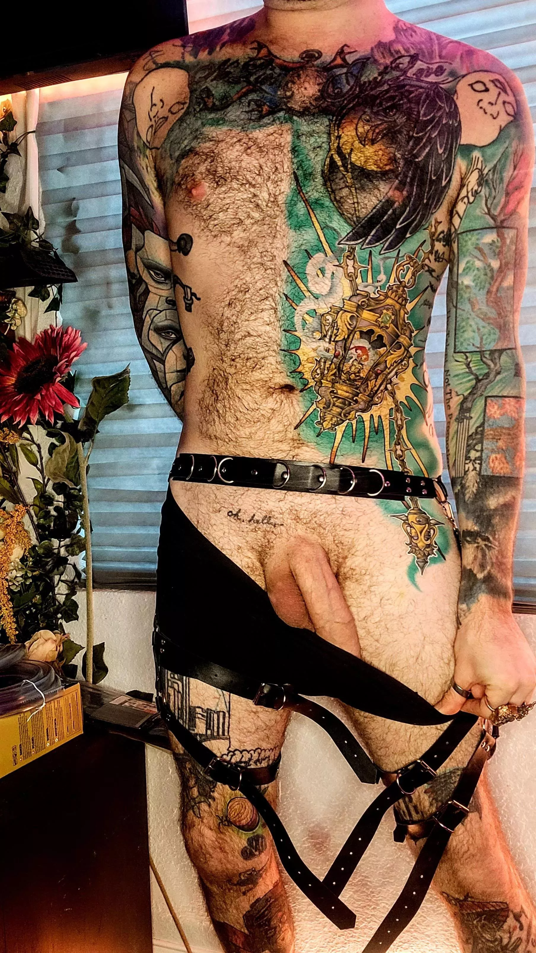 The black leather against my colorful skin is the aesthetic that gets my blood moving