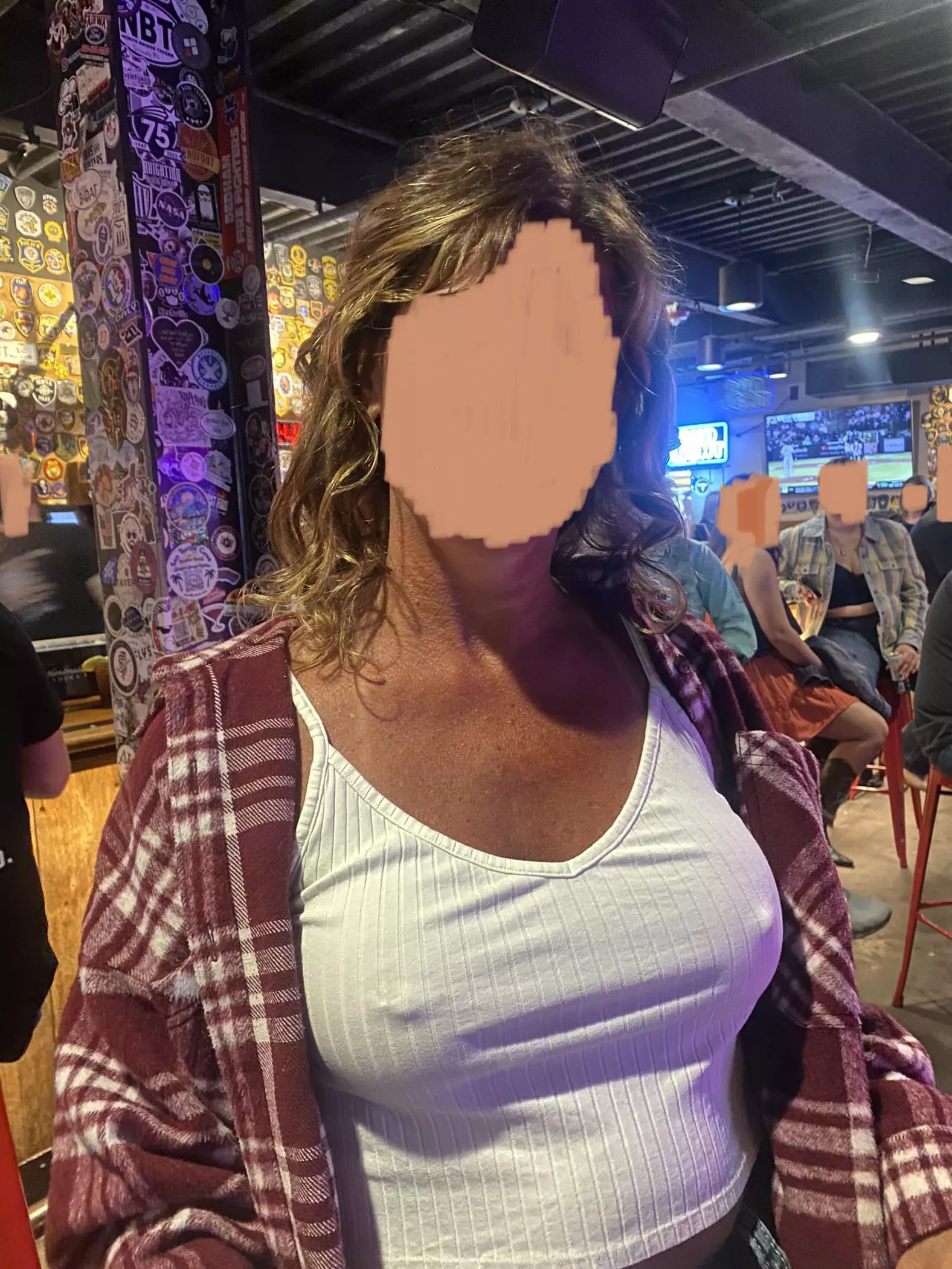 Loves the attention her big braless nipples get.