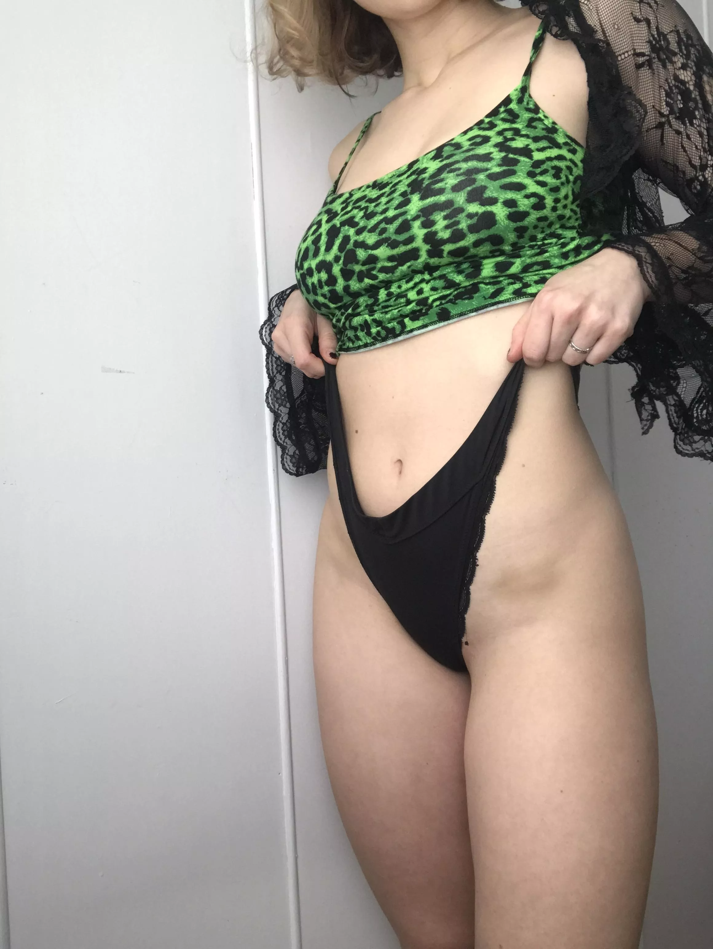 Green leopard tries to teas you