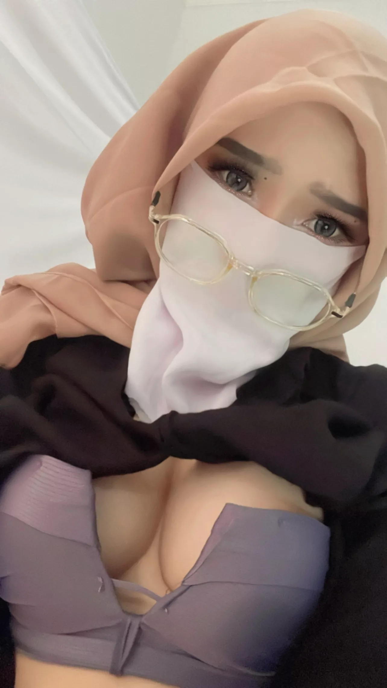 Can I still wear my hijab while we bang?