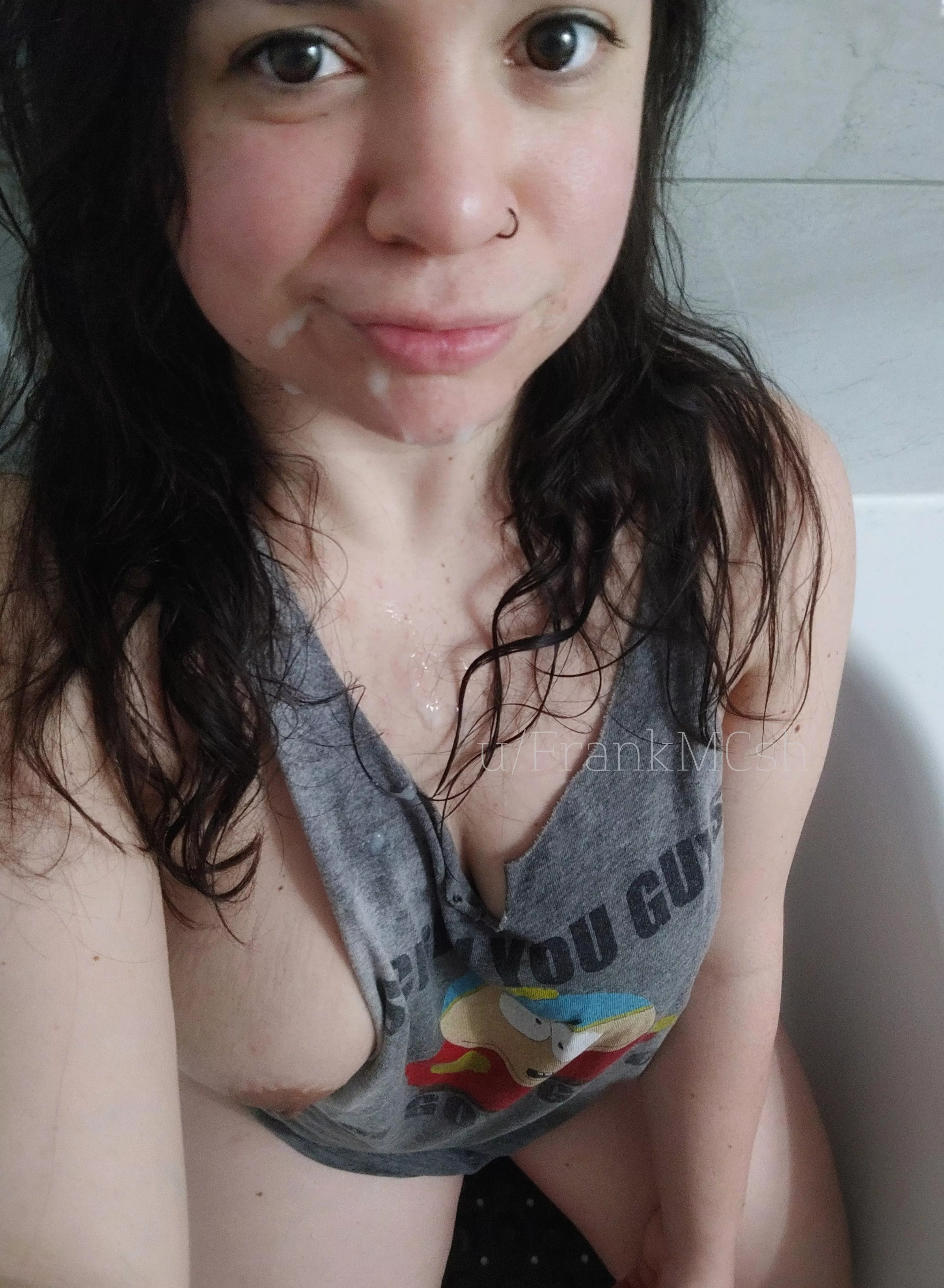 The face of a satisfied cum slut