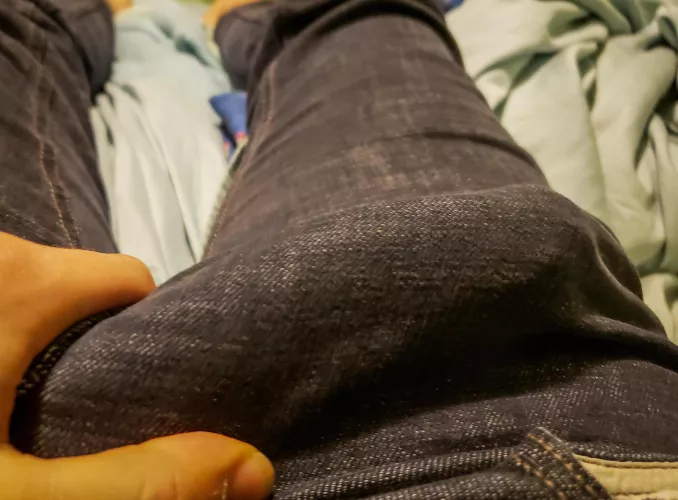 Stretching some jeans to their limits.