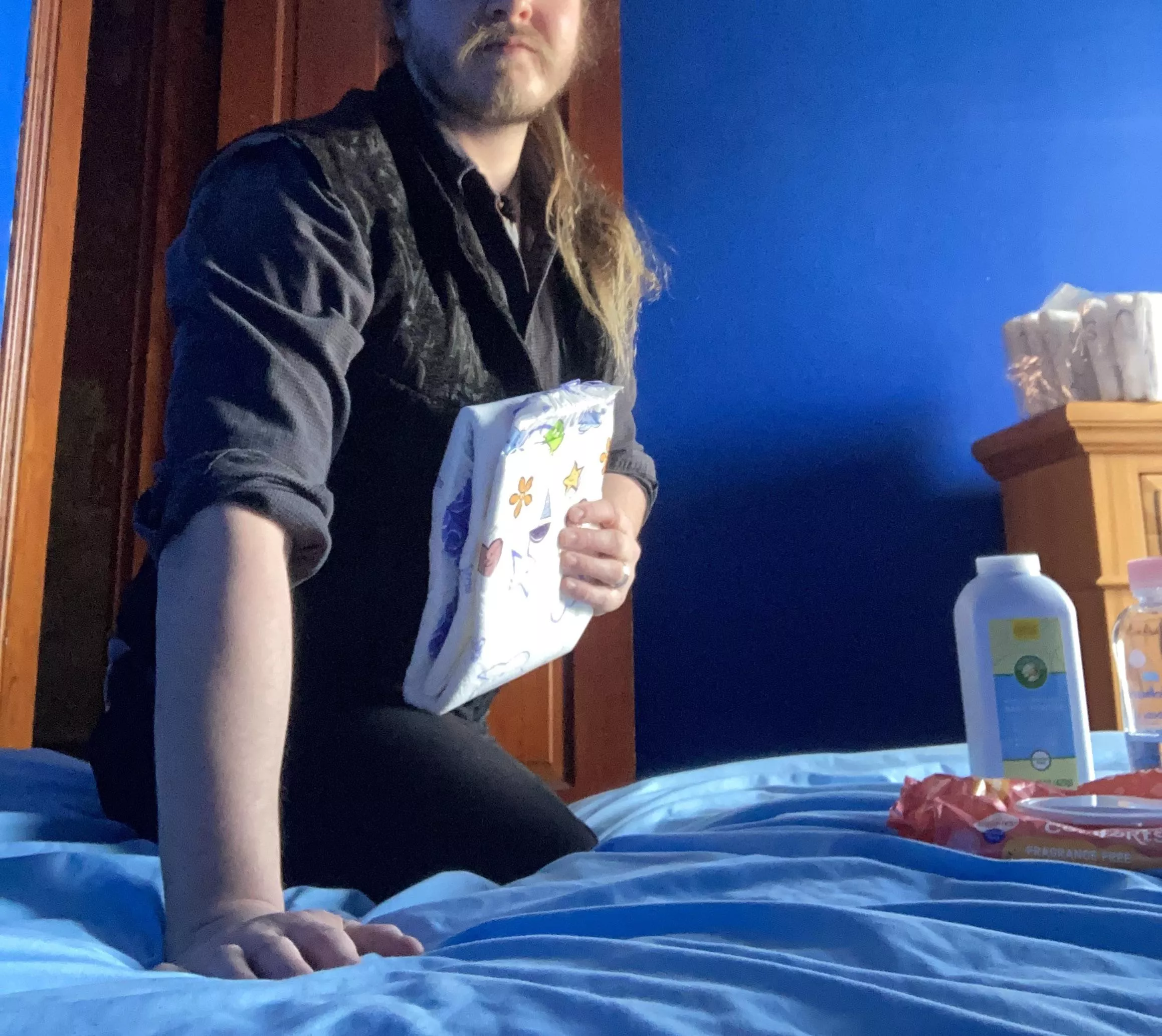 Come on baby, just lay down. I know you need changed.