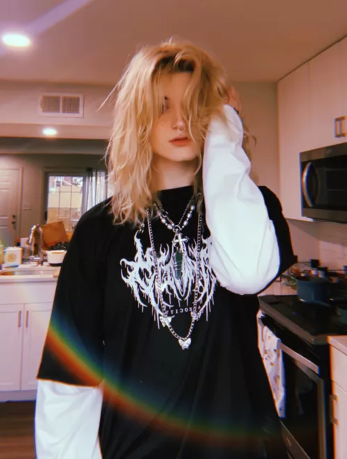 goth puppy boy in the sunrise