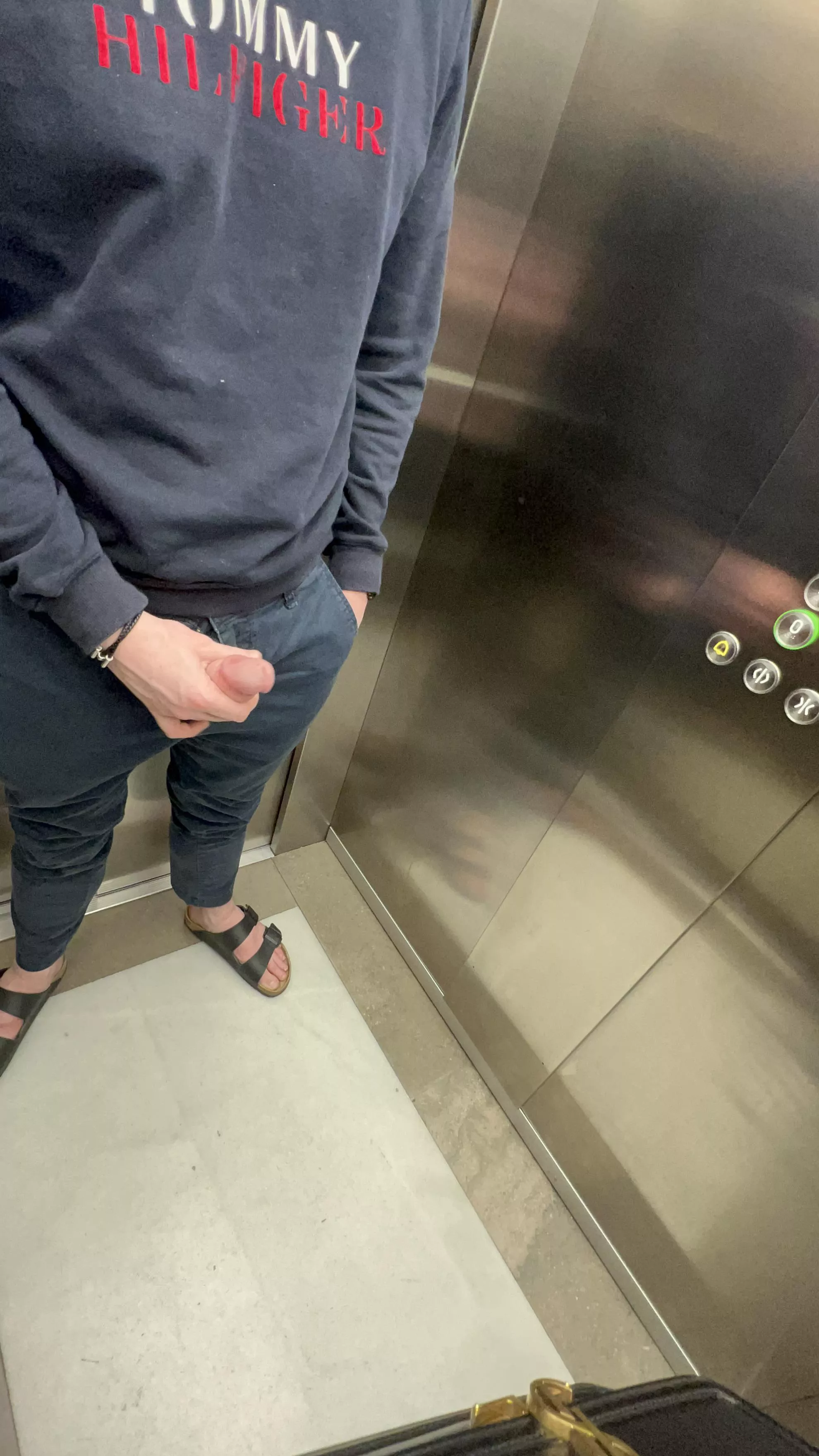 In the elevator - again