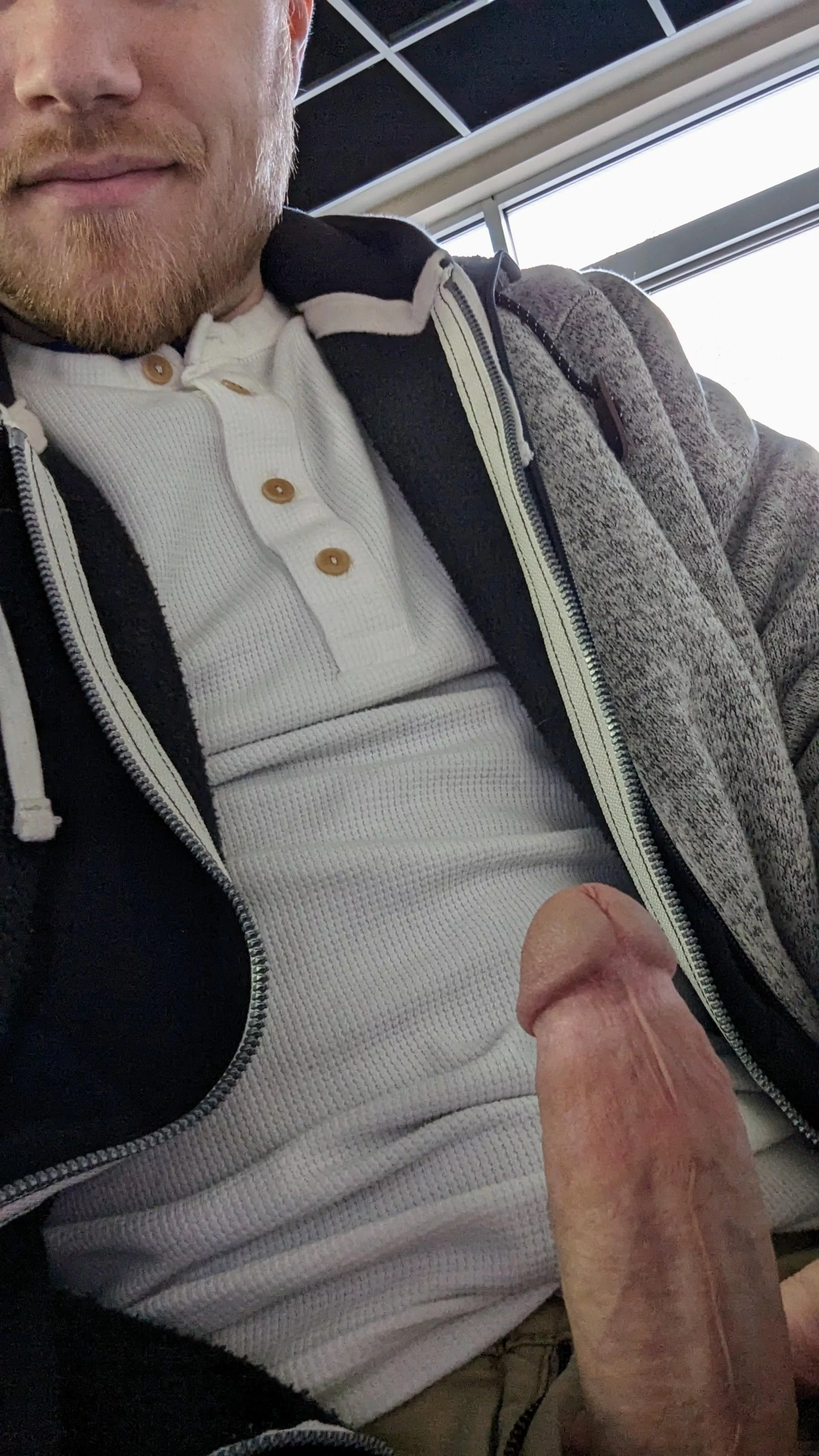 What is it about being in my office, around other people, that makes me want to sneak my cock out?