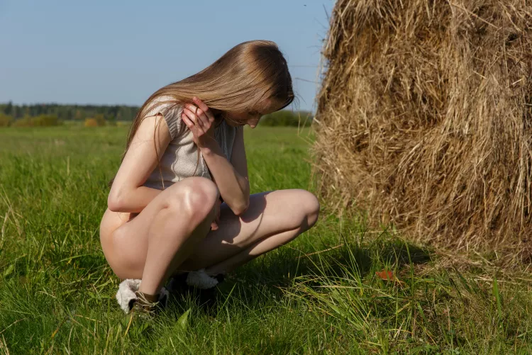 pissing in the grass