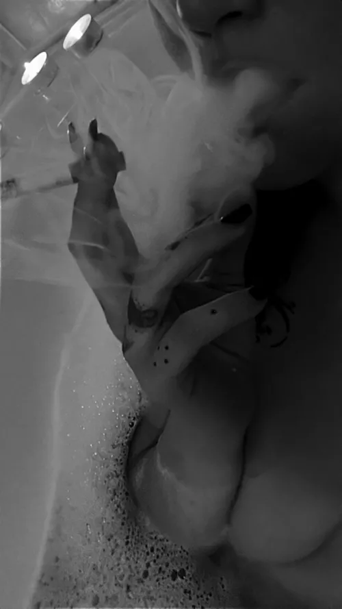 smoking my cigarette in the bathtub