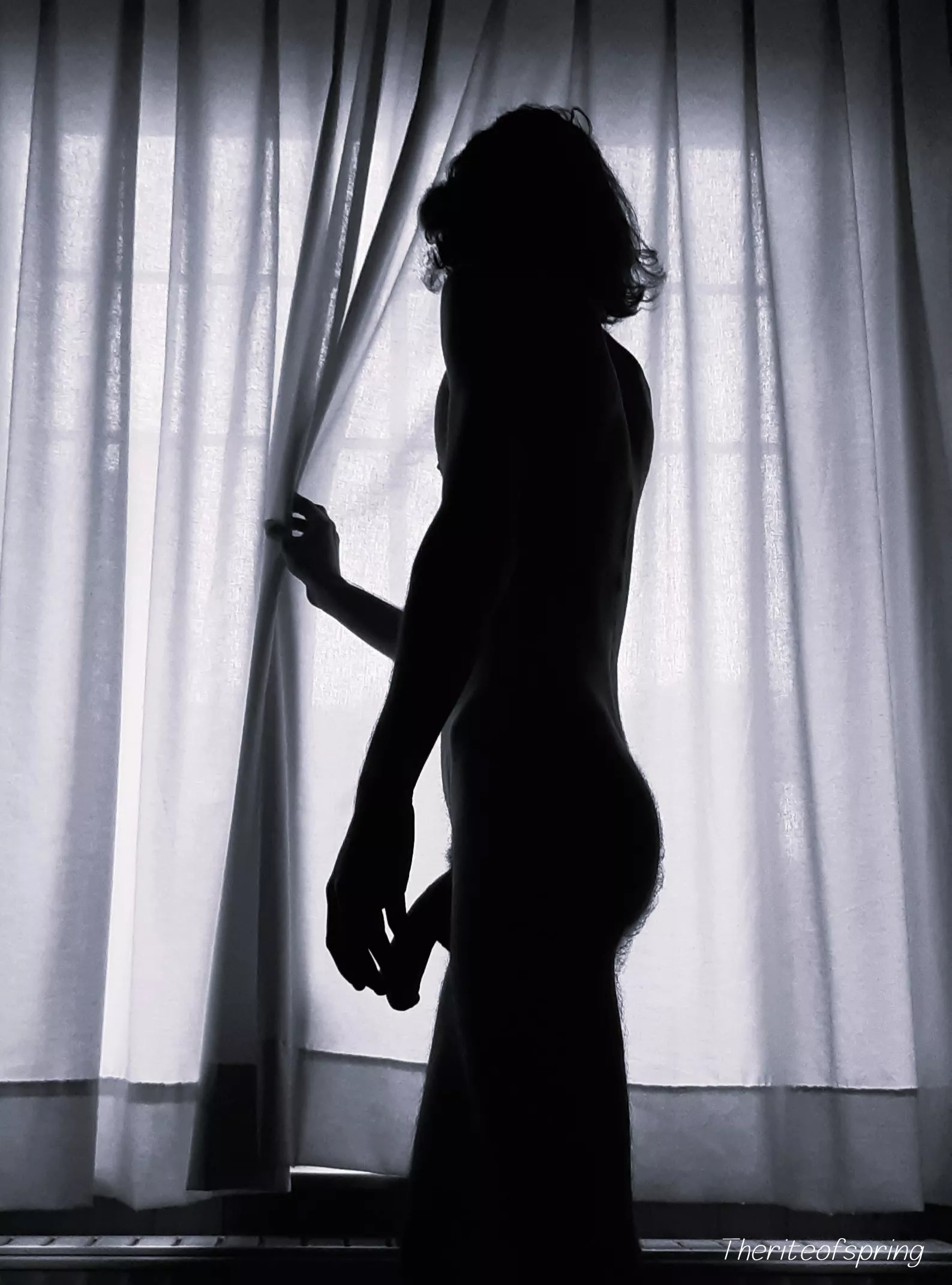 While peeking through the window