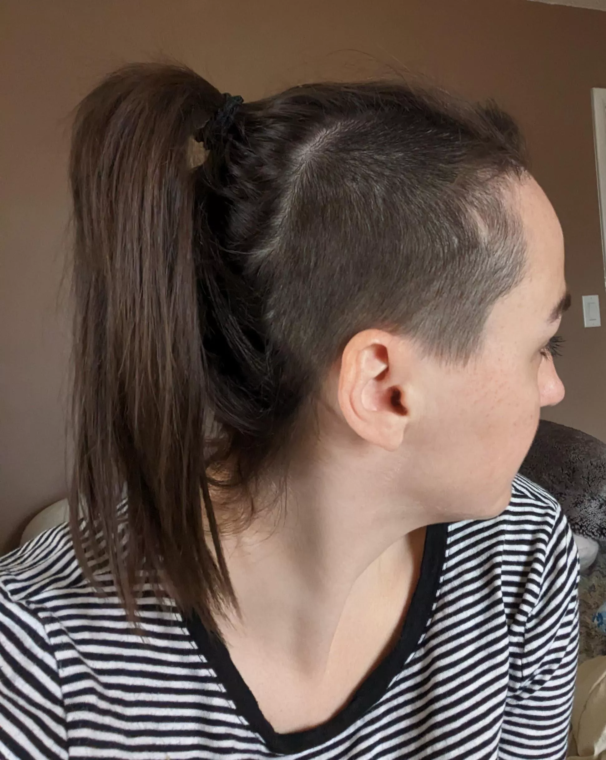 Does a half shaved pony tail count?