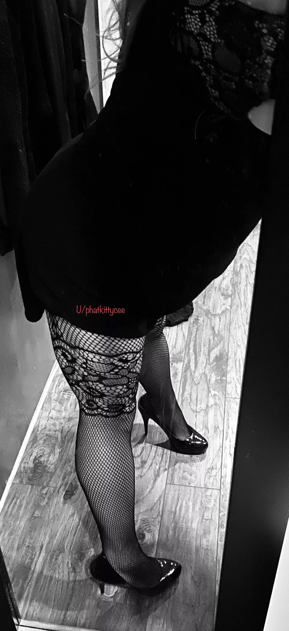 Partially bent over in black dress, wearing crotchless stockings and heels 👠. Would you like?