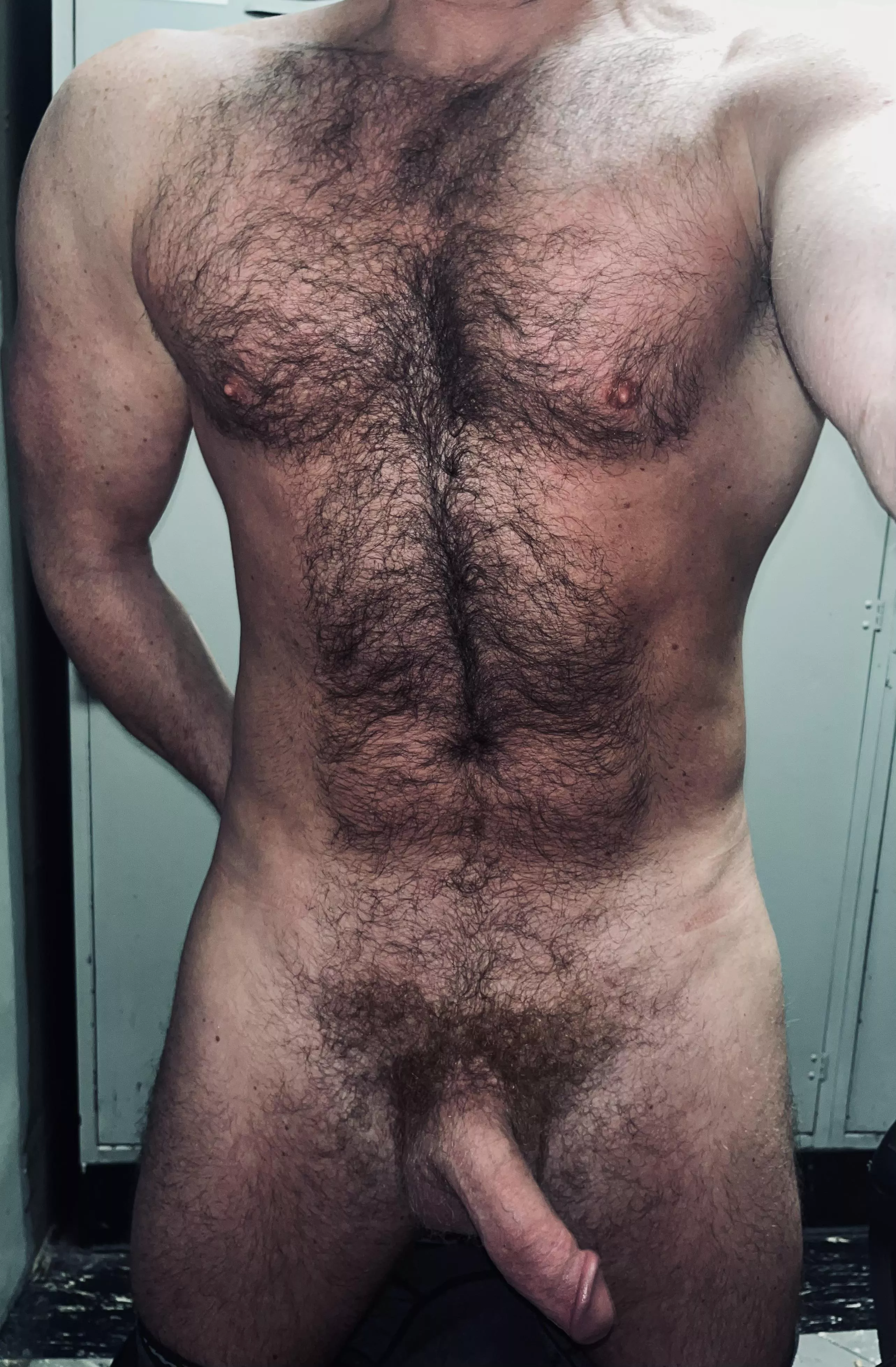 Naked in a storage area at work