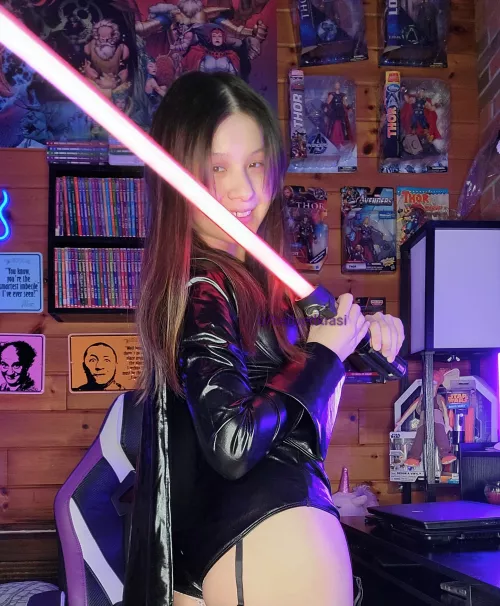 Woman version of Darth Vader and my little cheeks to entice you to the dark side