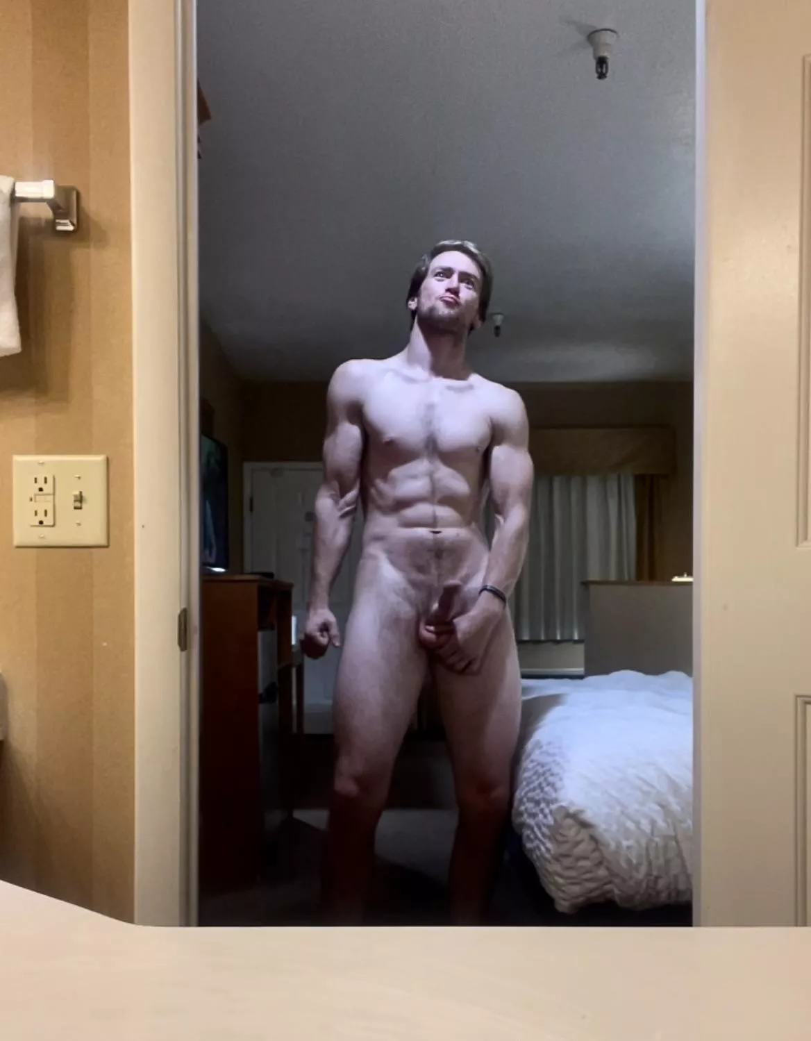 6’6” drunk naked flexing hotel man