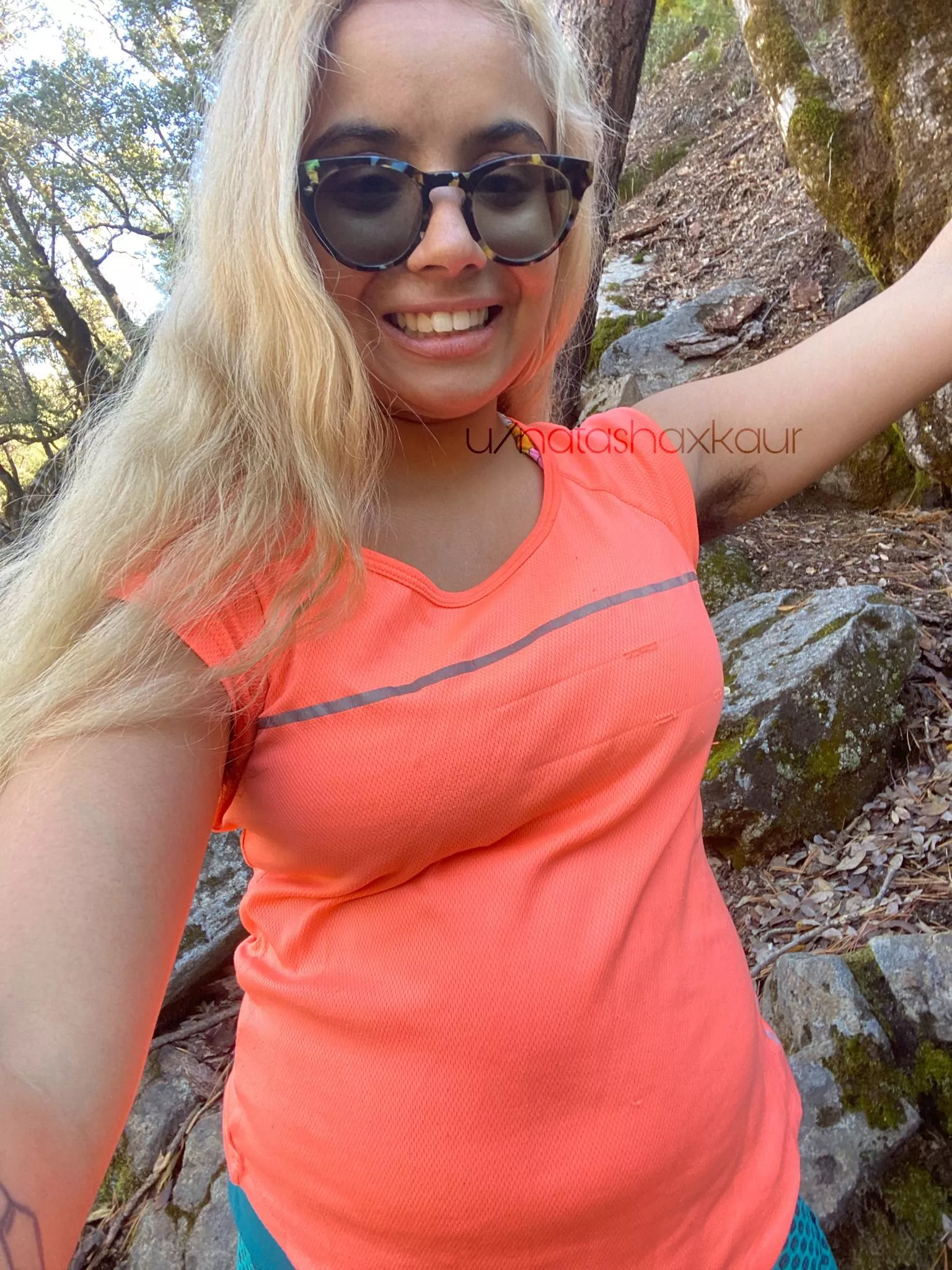 My armpit hair is so long and wispy that it peeks through my shirts