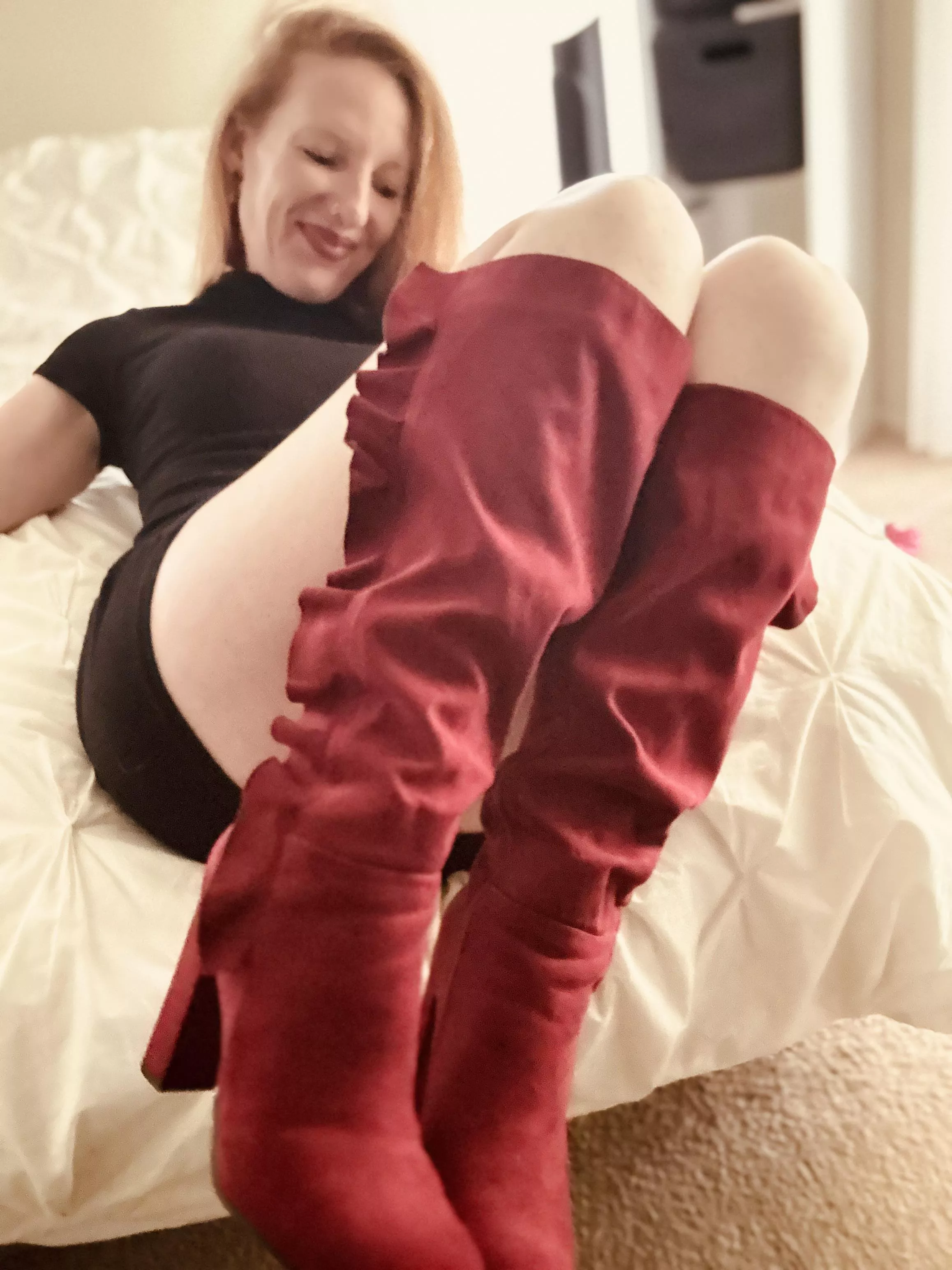 Red boots and a little black dress