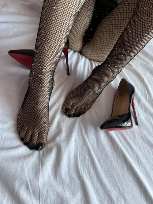 Took off my Louboutins after work 😊 do you like black fishnets with diamonds? 😍