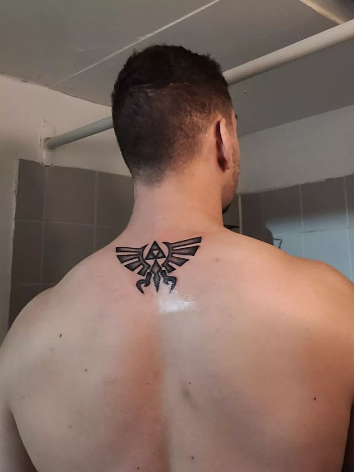 When I was a teenager I got a Zelda tattoo done in someone's basement and to nobody's surprise, it turned out to be really ugly lol... Well, I finally went and got it fixed by a good artist :)