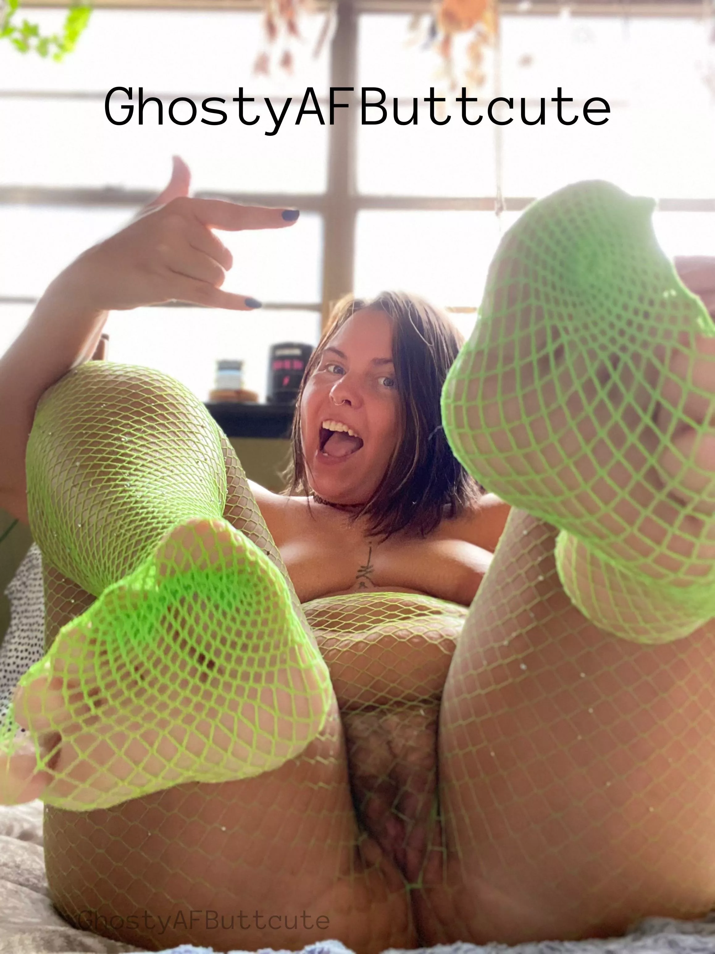 I love a furry puss in fishnets!