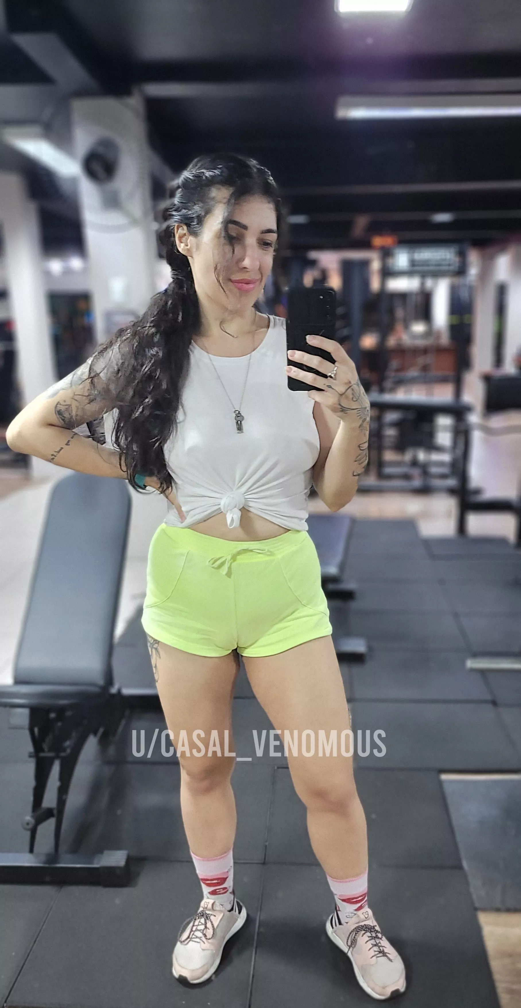 Taking that selfie at the gym. Braless and pantieless. With a camel toe as a bonus!