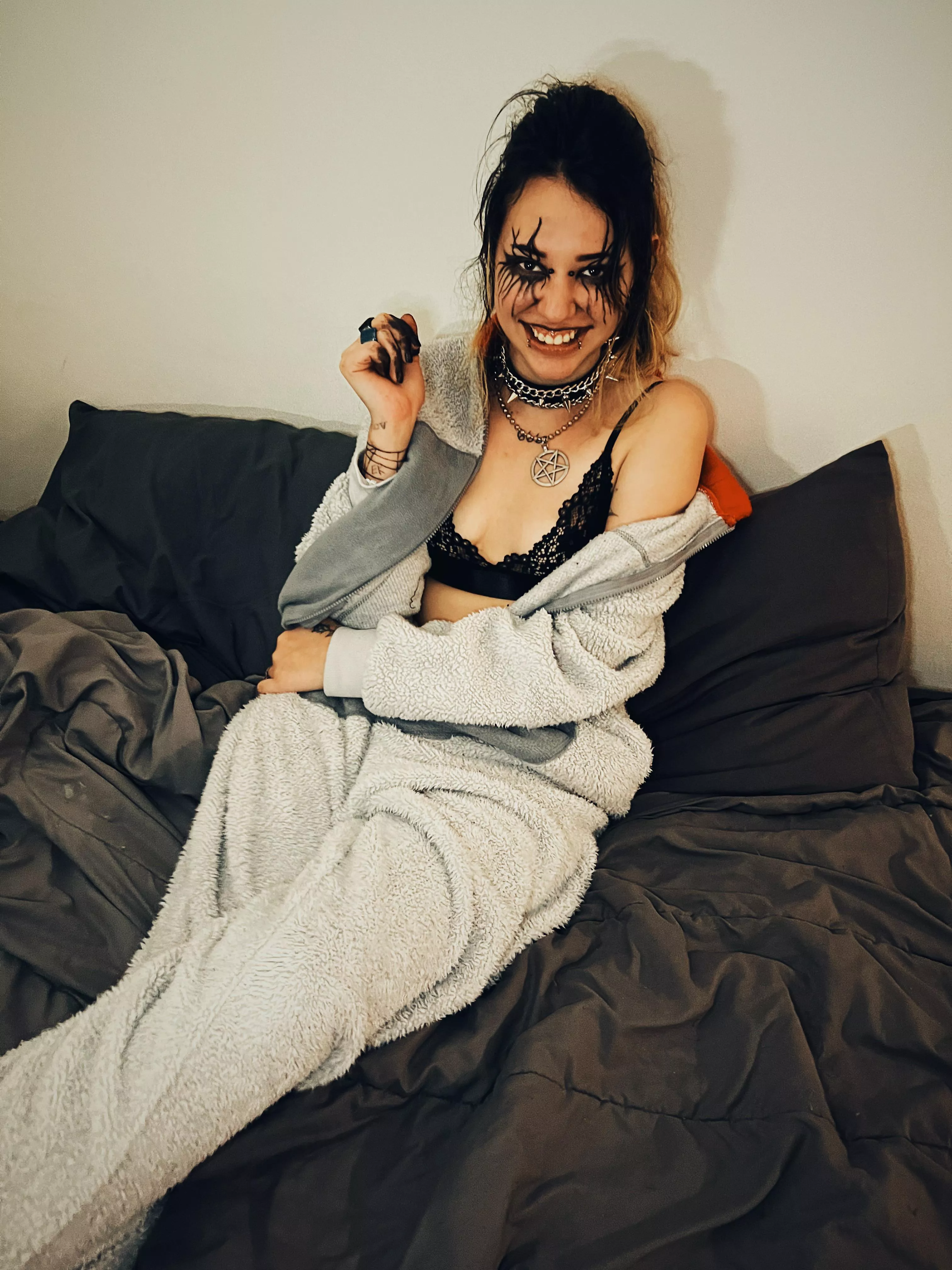 Thoughts of a goth girl in lingerie and a onesie?