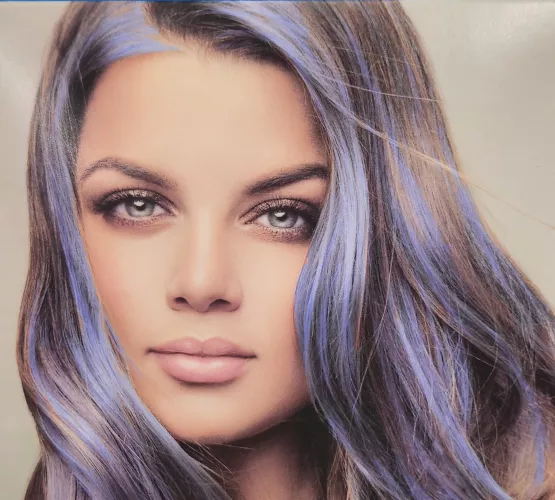 Hair streaked blue eyed babe