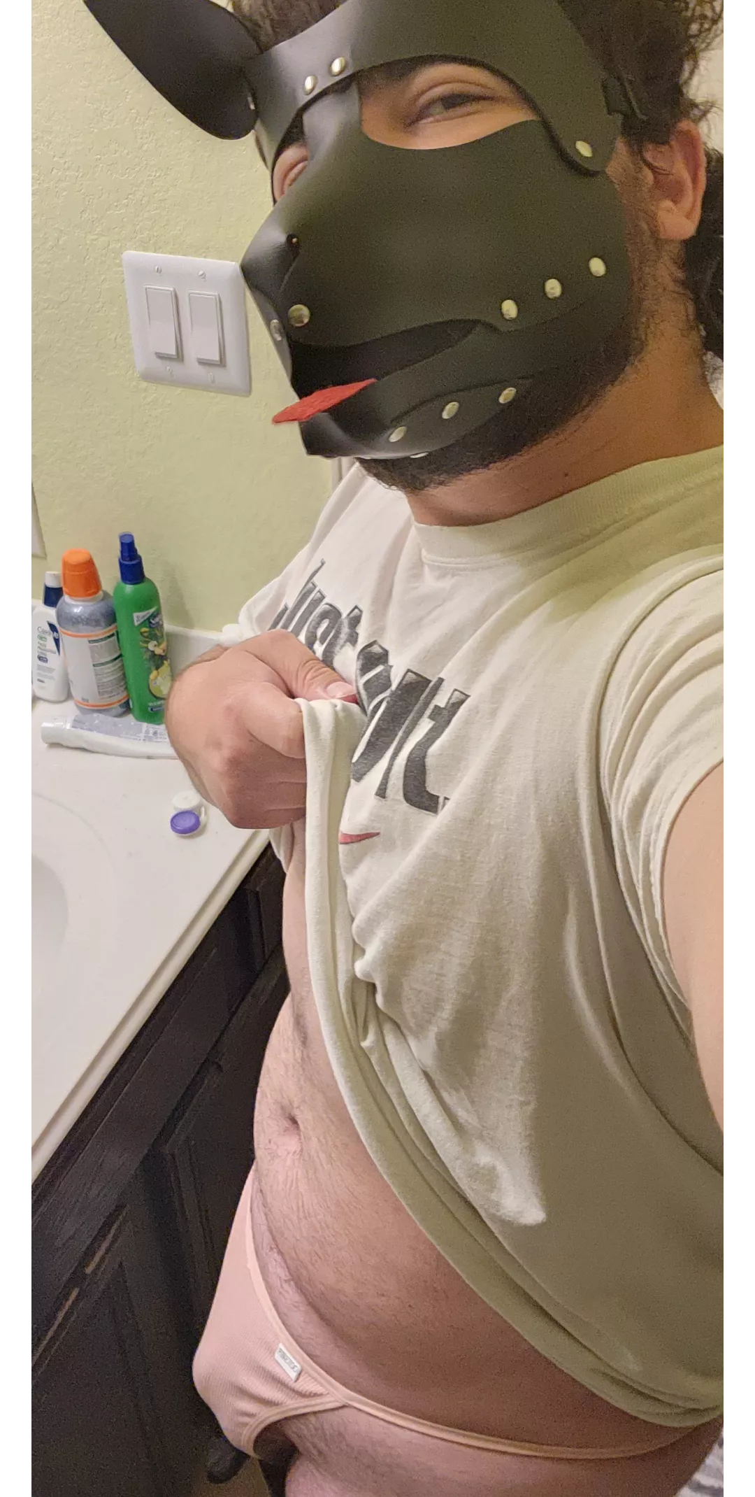 It ain't a jock, but this pup is showing off some skimpy panties!