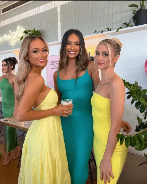 Pretty smiles and pretty dresses.