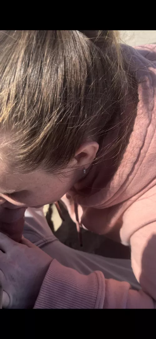 Sitting on the beach in broad daylight and she just started sucking me