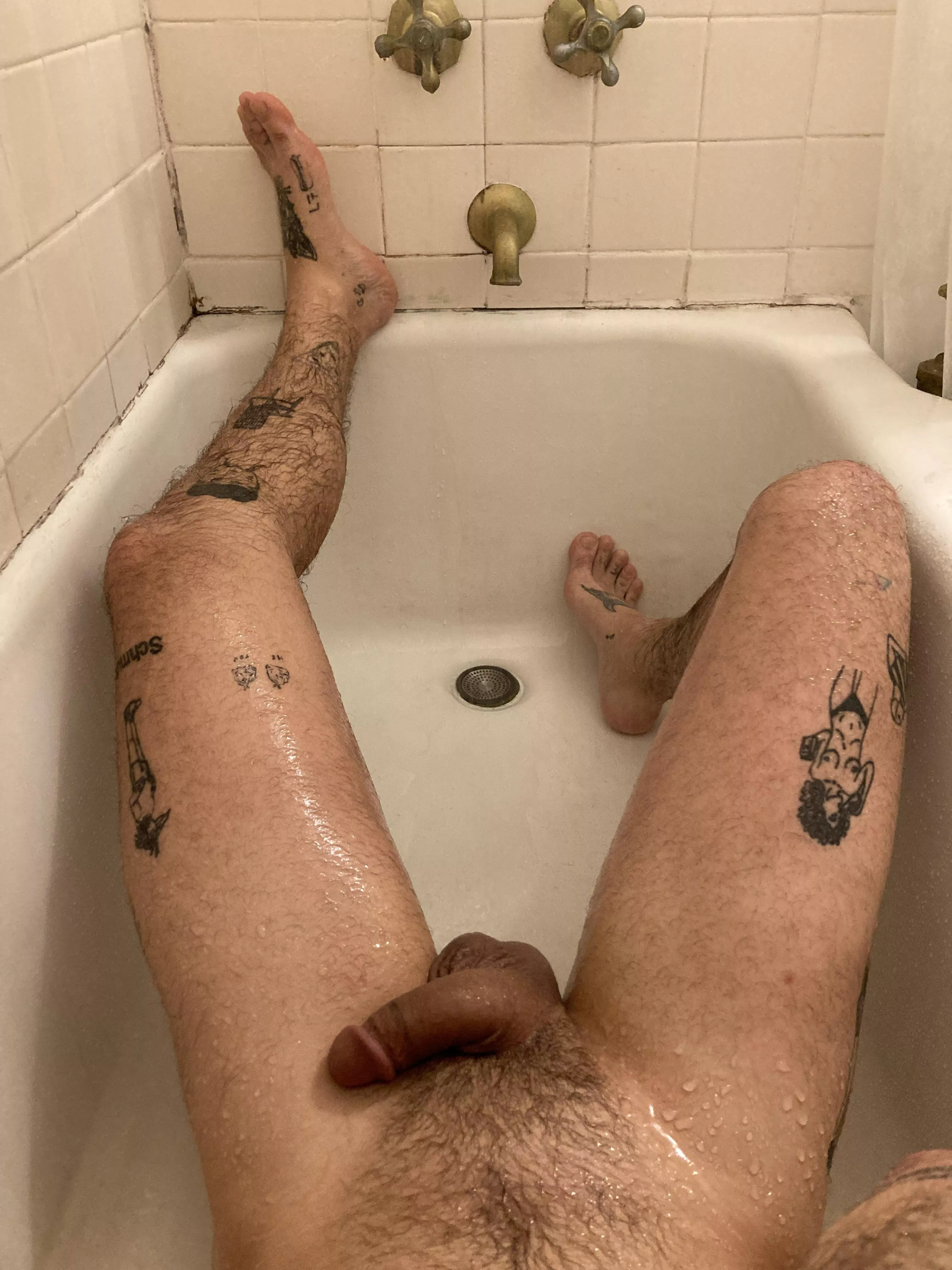 Showerbath: hot water in the tub. Cold water on top.