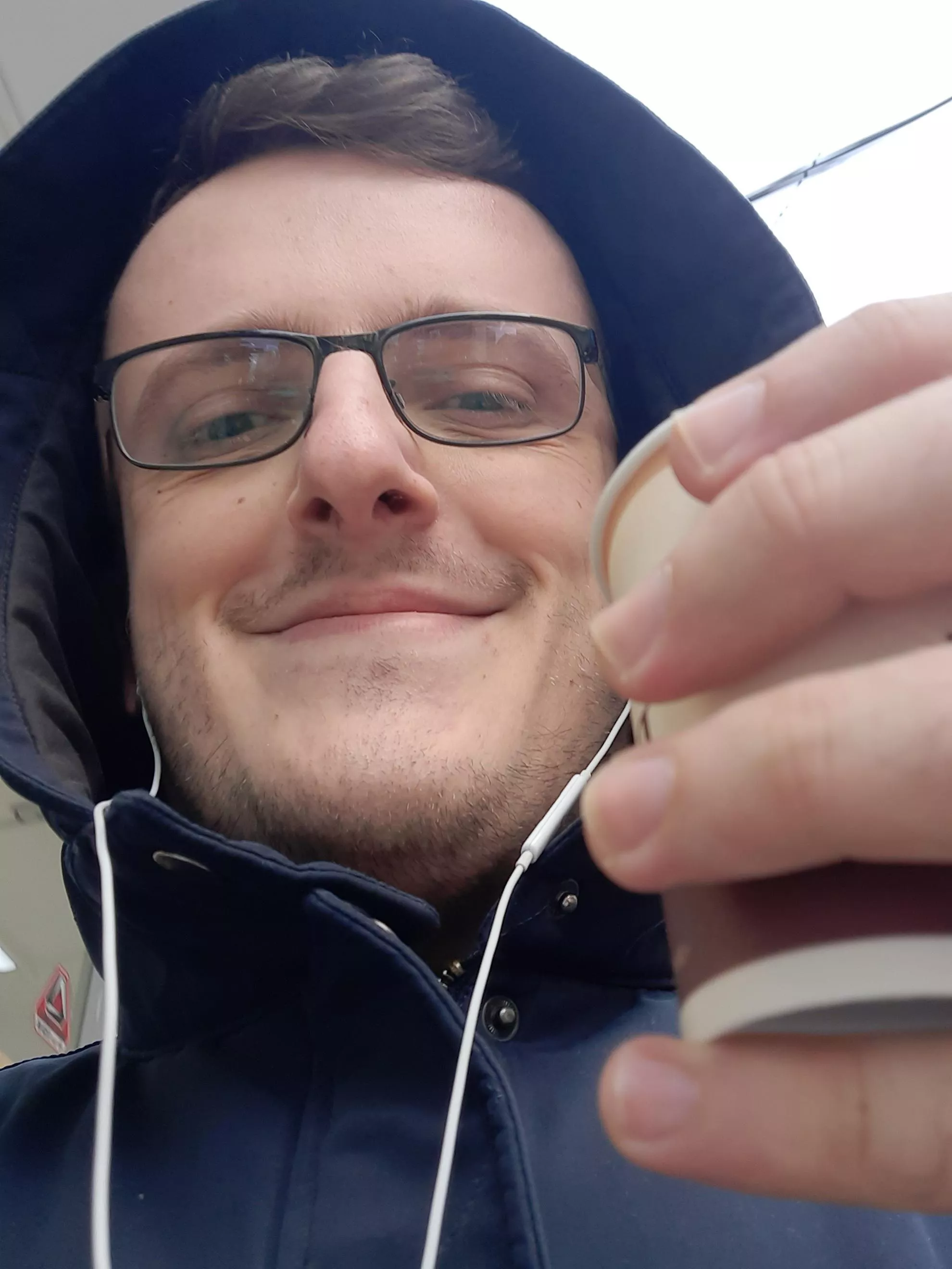 I took this picture of me this morning, right after getting my coffee. on my way to my new job, a job that has been my dream ever since college. I am finally a Technical Writer.