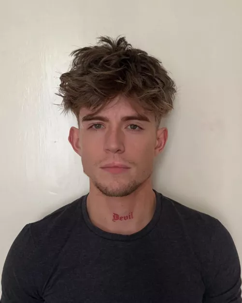 Is my passport photo okay? People say the tattoo ruins it, idk, i have more tattoos of course but just picture wise do i look silly :/?