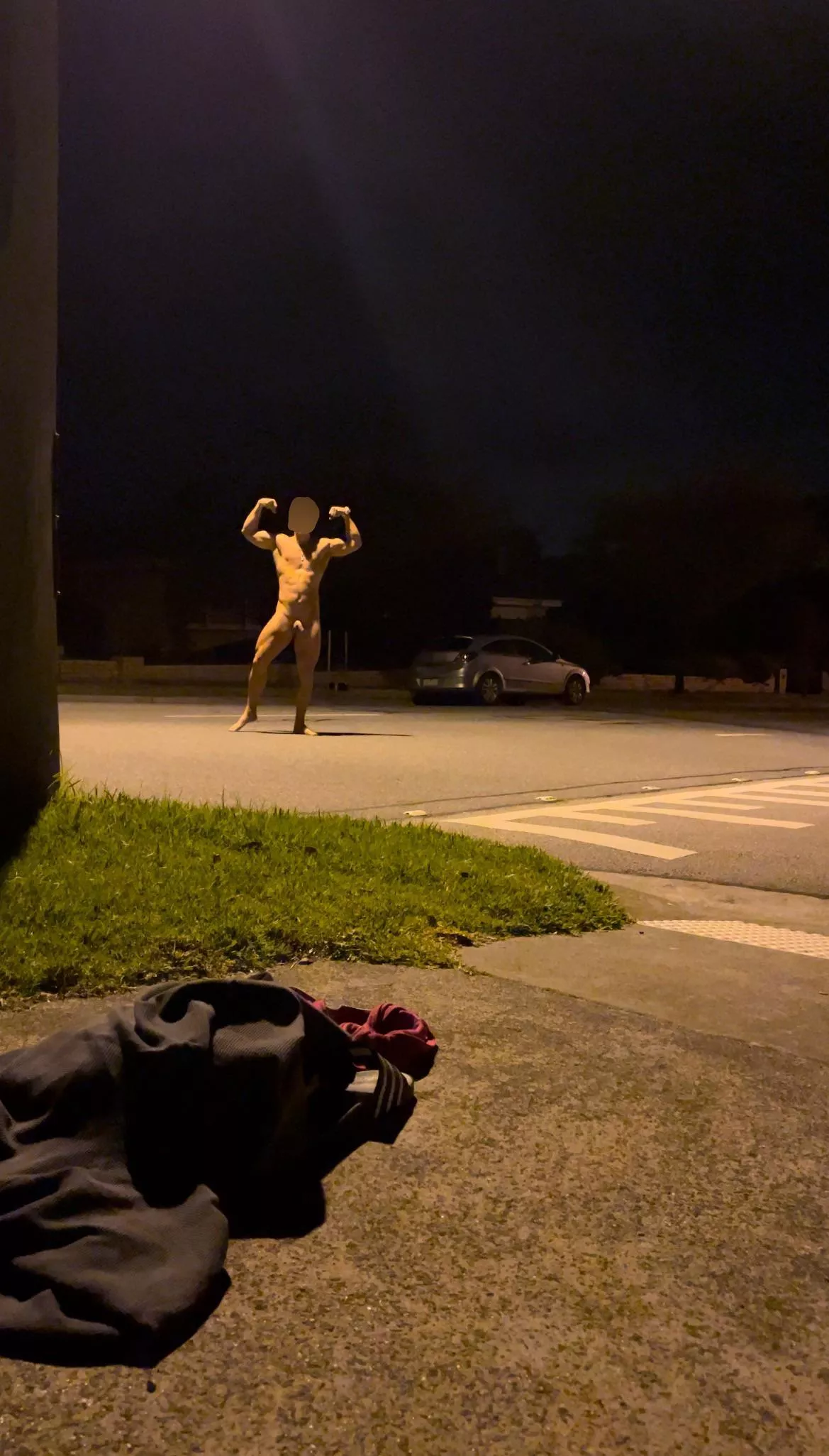 Nudie runs under the street lights!
