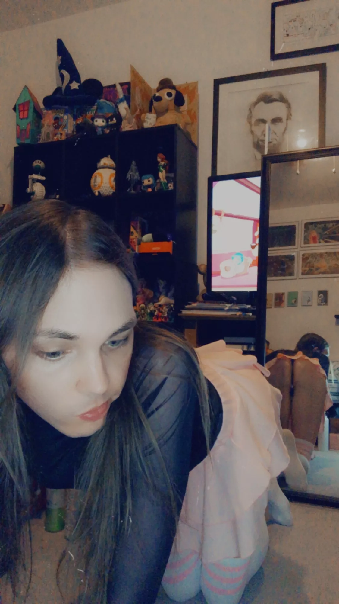 Can you help me find my glasses? They are down here somewhere.