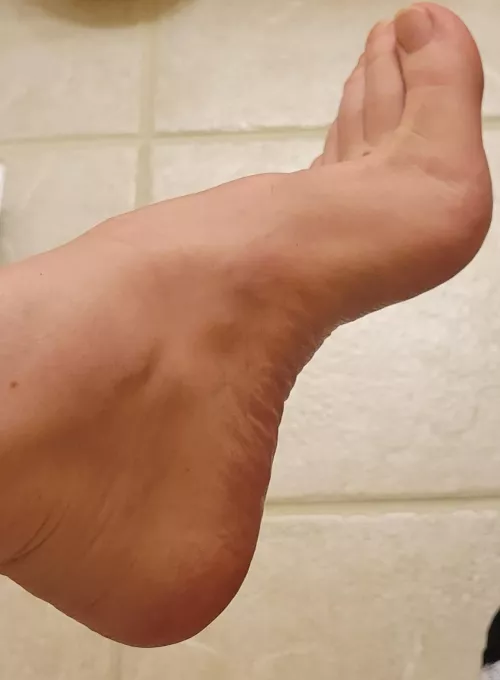 Legs crossed, my left foot... would I catch you staring?