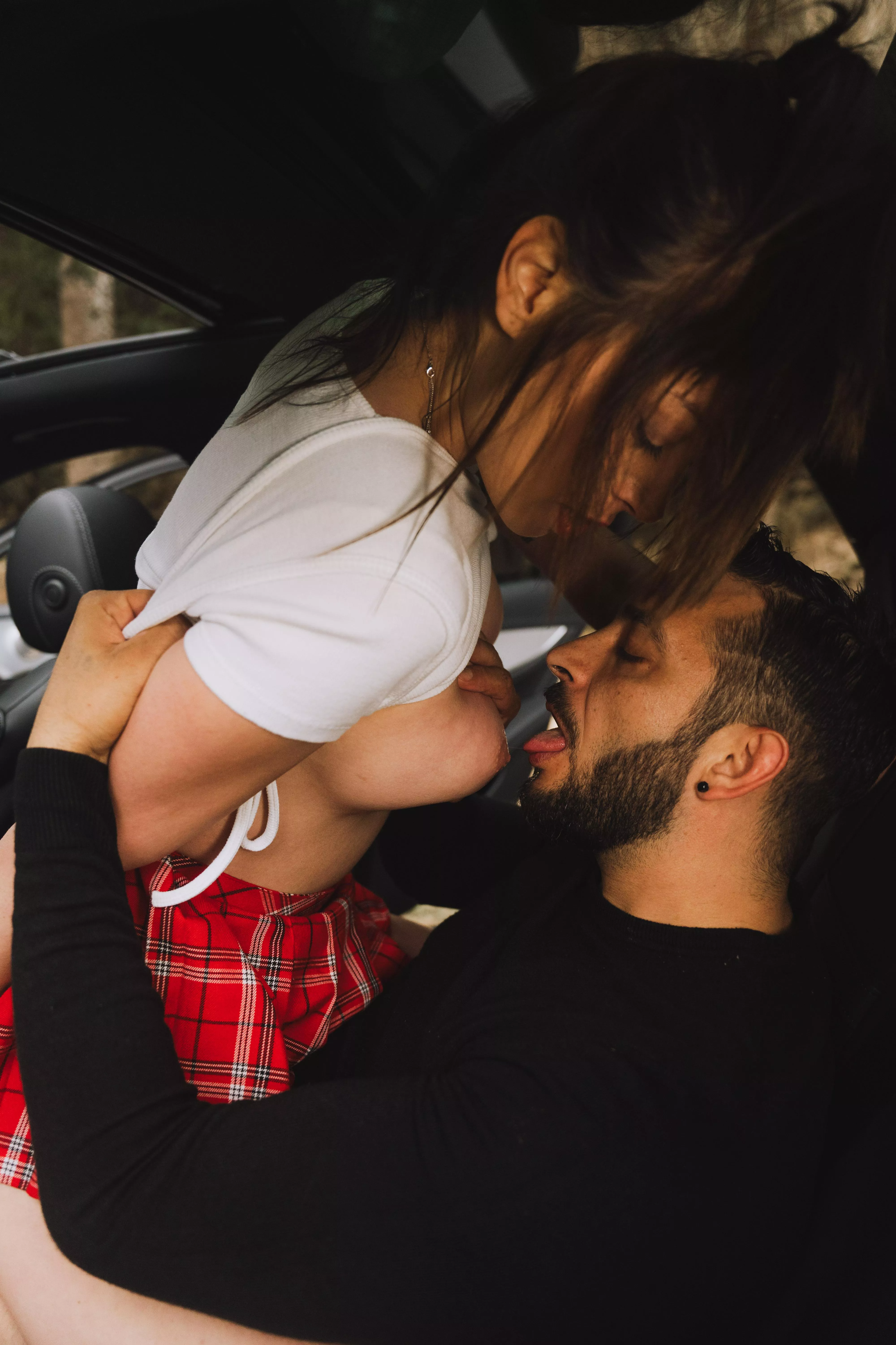 Sexy red skirt in black car 😈