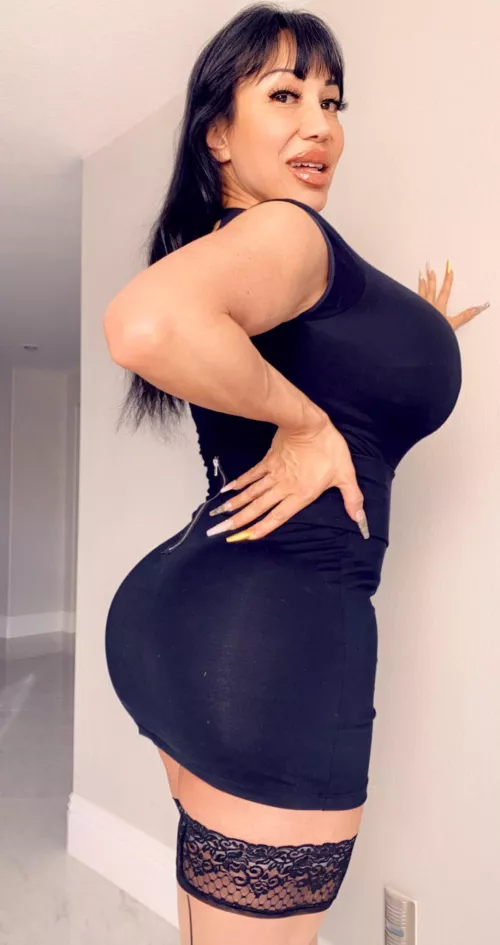 Drives me nuts how far her fake ass and jugs push her clothes out!